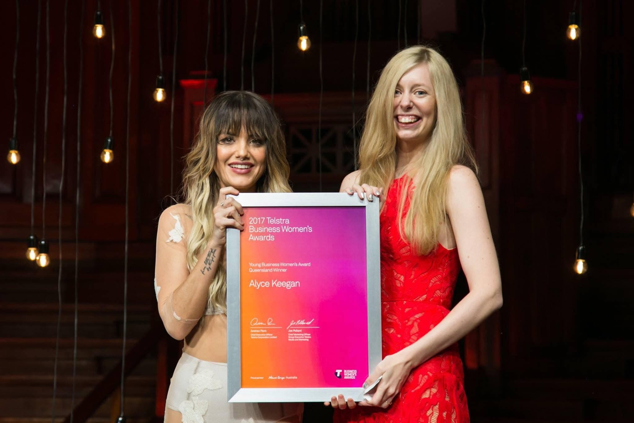 Alyce accepting the Telstra Young Businesswoman of the Year award